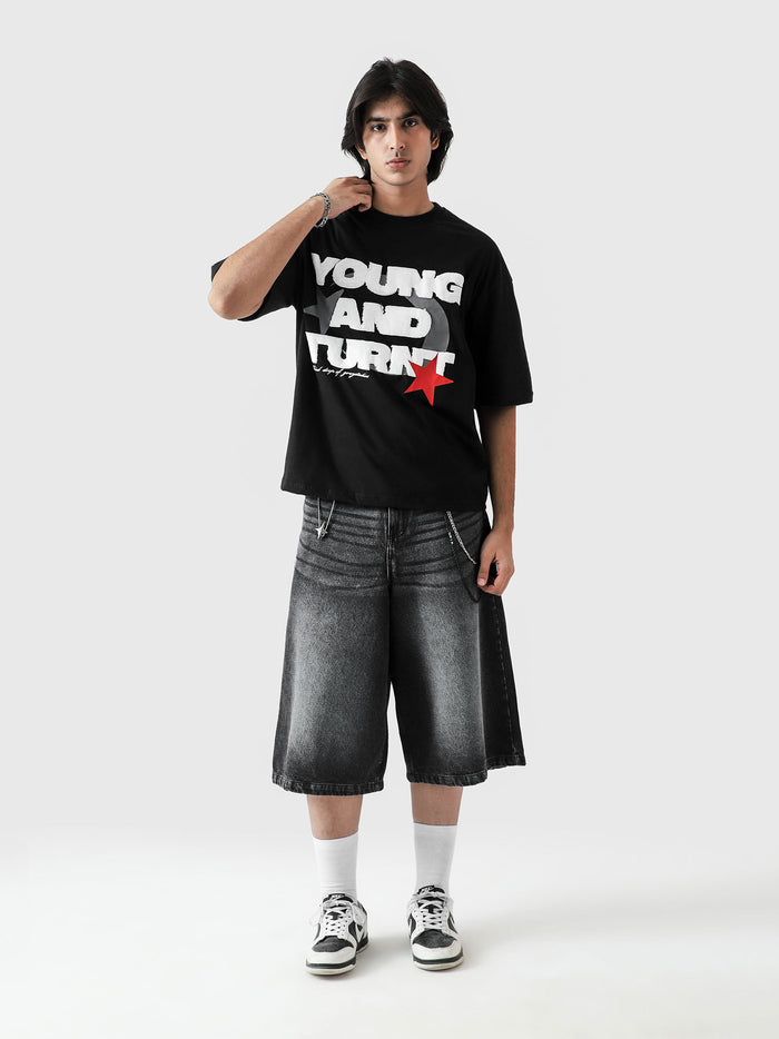Young and Turnt tee male model full body front view bold graphic Pakistan – GROOVY